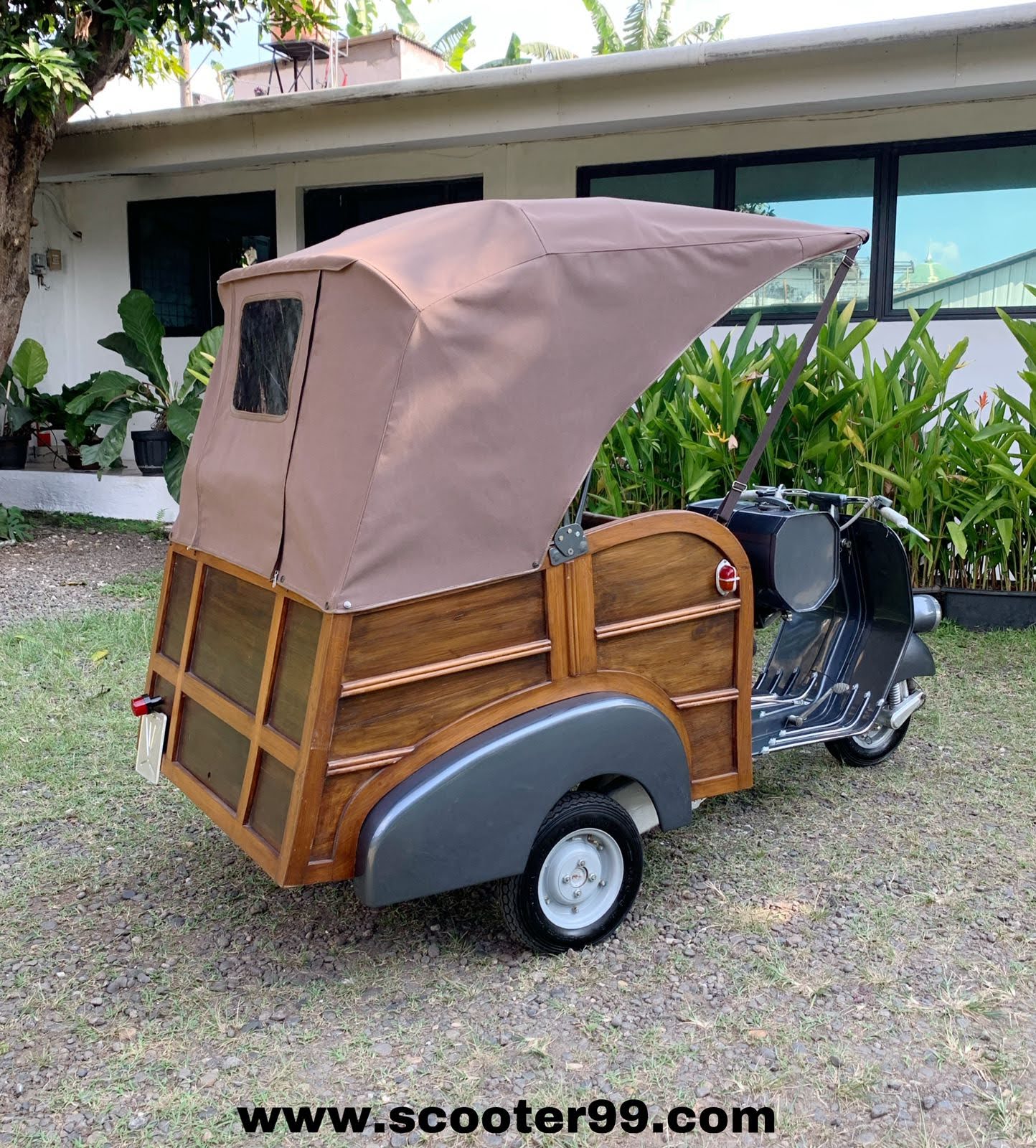 Detail of Ape Calessino Grey teak panels and canvas canopy